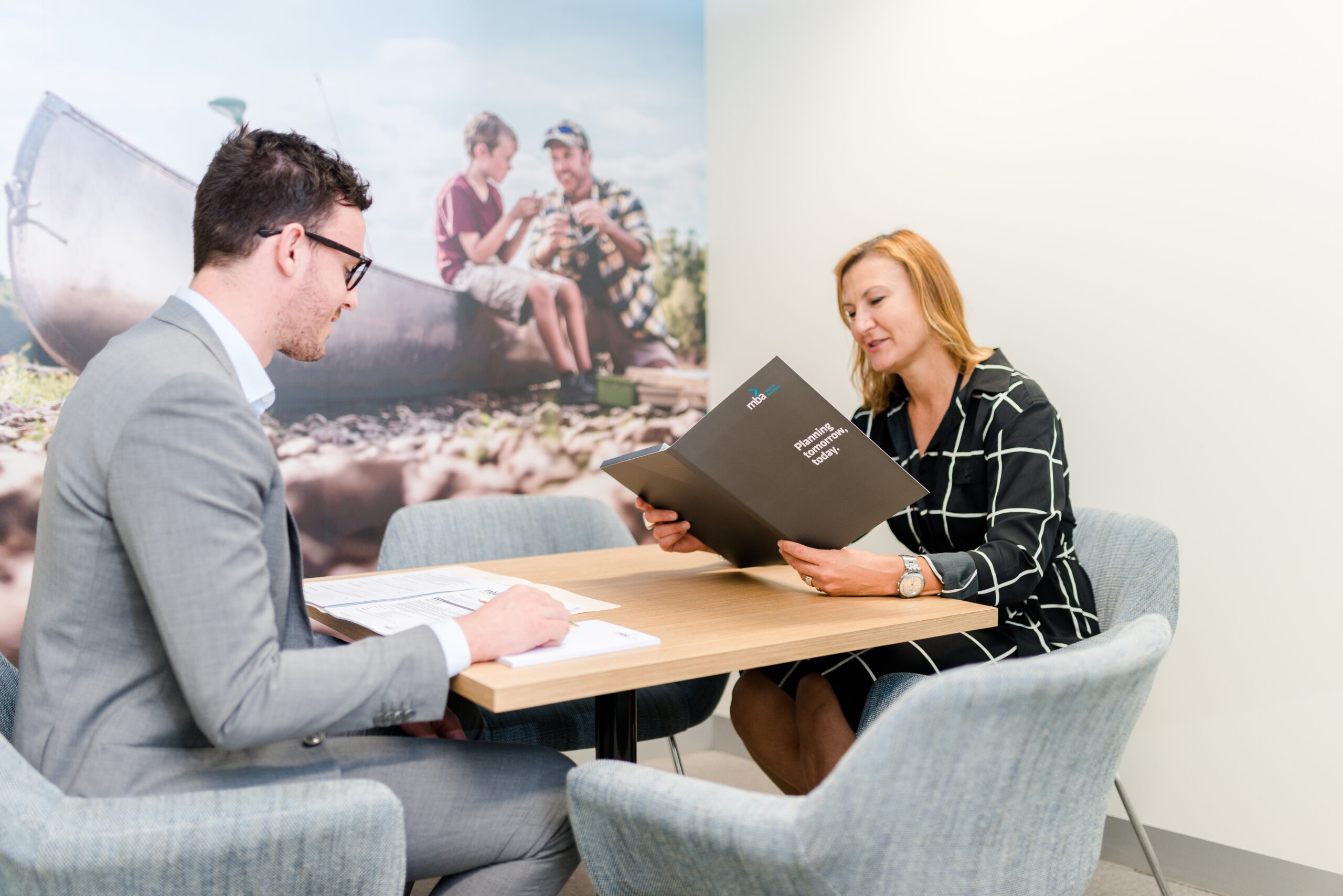 Meeting between financial adviser and a client